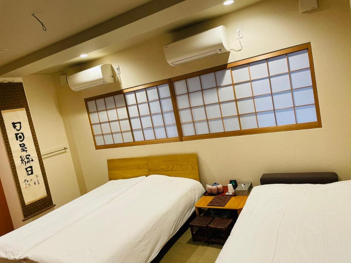 Hotel Saikou à Ōsaka Extérieur photo