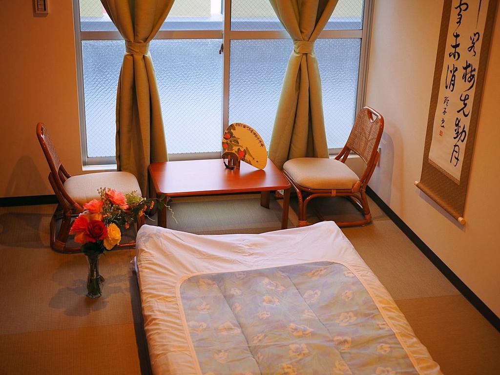 Hotel Saikou à Ōsaka Extérieur photo
