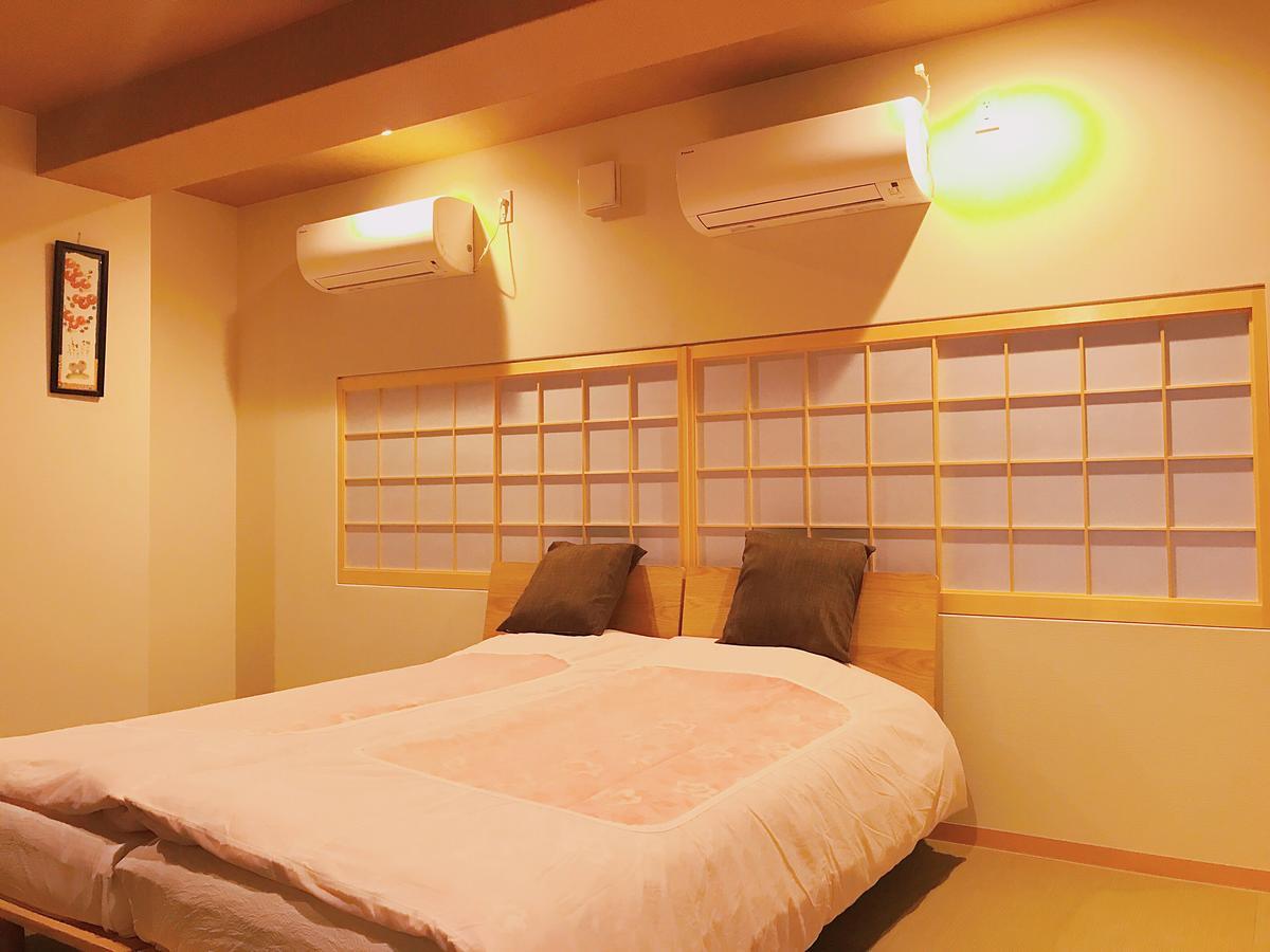 Hotel Saikou à Ōsaka Extérieur photo