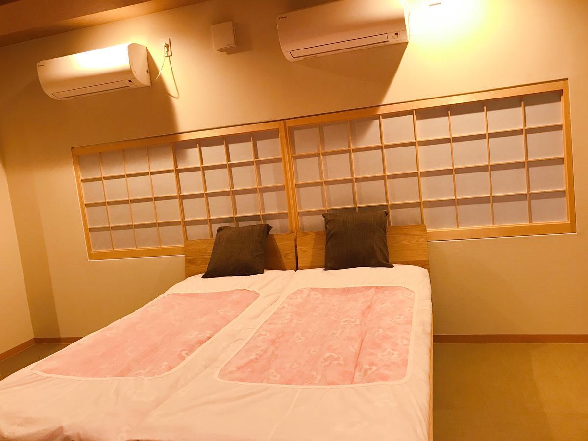 Hotel Saikou à Ōsaka Extérieur photo